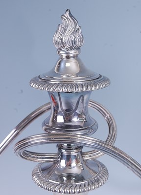 Lot 2152 - A pair of silver plated three-light candelabra...