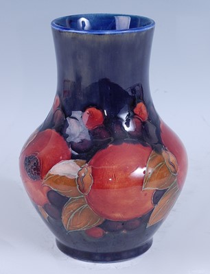 Lot 80 - A Moorcroft Pomegranate pattern pottery vase,...