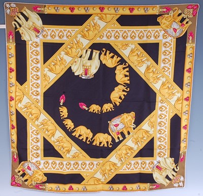 Lot 303 - Must de Cartier - a vintage silk scarf,...