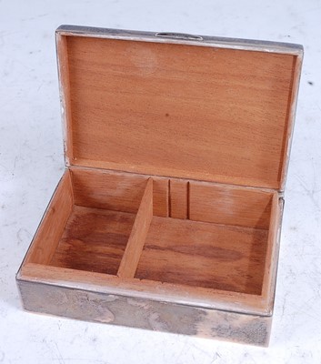 Lot 239 - An Art Deco style silver table cigarette box,...
