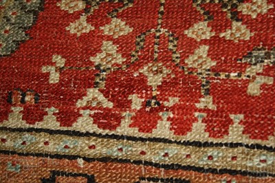 Lot 2442 - A Persian woollen Bakshaish carpet, the red...