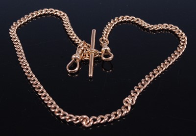 Lot 2233 - A 15ct gold curblink watch chain with Albert,...