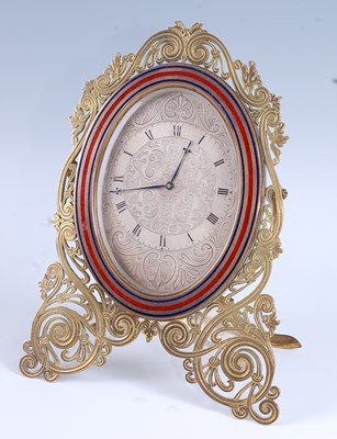 Lot 2427 - A Victorian cut brass strut clock, circa 1870,...