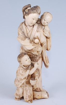Lot 2326 - A Japanese Meiji period carved ivory okimono,...