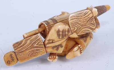 Lot 2325 - A Japanese Meiji period carved ivory okimono,...