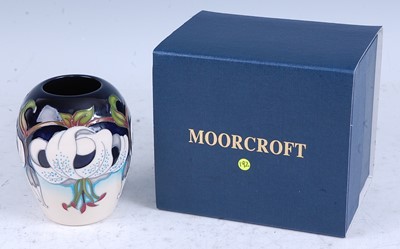 Lot 103 - A contemporary Moorcroft miniature vase in the...