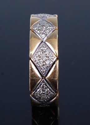 Lot 2231 - A Chanel Matelasse yellow metal flexible ring,...