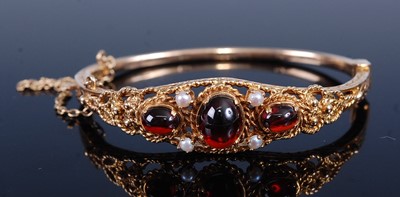 Lot 2223 - A 9ct yellow gold, garnet and pearl hinged...