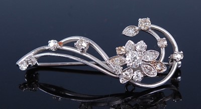 Lot 2205 - An 18ct white gold diamond floral spray brooch,...