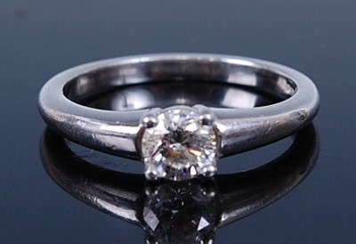 Lot 2185 - A platinum diamond solitaire ring, featuring a...