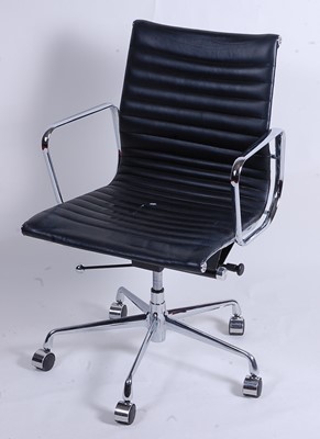 Lot 604 - After Charles & Ray Eames - a polished...