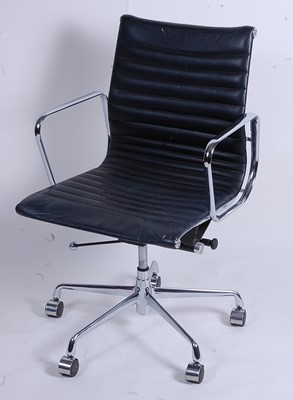 Lot 606 - After Charles & Ray Eames - a polished...