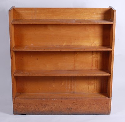 Lot 493 - A 1950s light oak four-tier double-sided open...