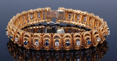 Lot 2190 - An 18ct yellow gold, sapphire and diamond...