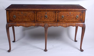 Lot 2478 - A walnut and burr walnut dresser base in the...