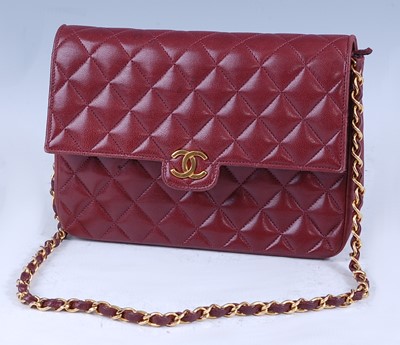 Lot 253 - A Coco Chanel burgundy leather quilted flap...