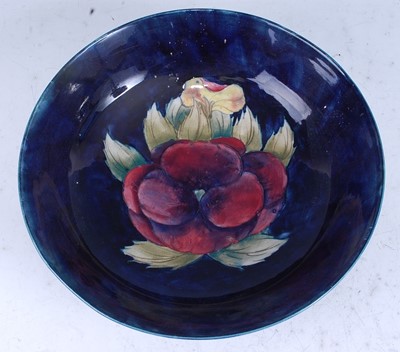 Lot 74 - A large Moorcroft Pansy pattern footed...