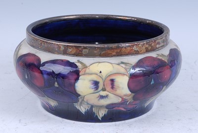 Lot 75 - A Moorcroft Pansy pattern pottery fruit bowl,...