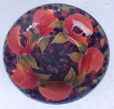 Lot 77 - A Moorcroft Pomegranate pattern footed...
