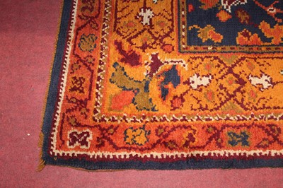 Lot 2451 - An Arts & Crafts Donegal woollen rug, the blue...