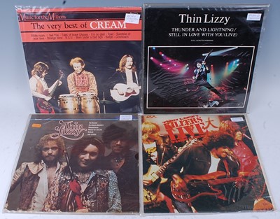 Lot 1038 - A collection of ten 12" singles and LP's to...