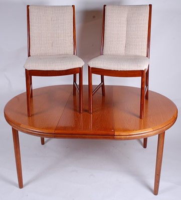 Lot 548 - A 1960s teak dining suite by White & Newton...