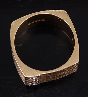 Lot 270 - A 1970s 18 carat gold fashion ring, having...