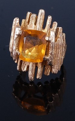 Lot 271 - A 1970s 9 carat gold and topaz set dress ring...