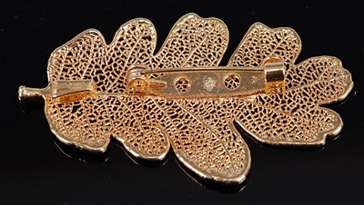 Lot 276 - A contemporary fine yellow gold filigree leaf...