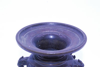 Lot 29 - A far eastern bronze vase, the flaring rim...