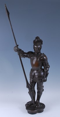 Lot 2295 - A bronze figure of a medieval knight modelled...