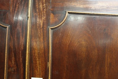Lot 2516 - A George III mahogany linenpress, having a...