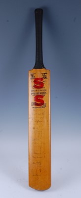 Lot 1296 - A Stuart Surridge cricket bat, signed by...