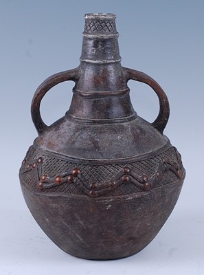 Lot 2409 - A burnished earthenware water bottle, the...