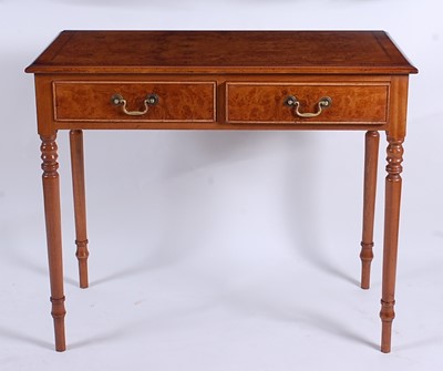 Lot 2508 - A walnut and figured walnut side table in the...