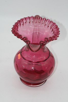 Lot 4 - A Victorian cranberry glass water jug, the...