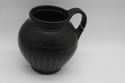 Lot 14 - Two Hungarian black burnished pottery jugs,...