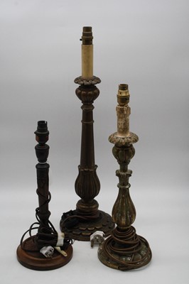 Lot 22 - A carved and gilt painted table lamp, height...
