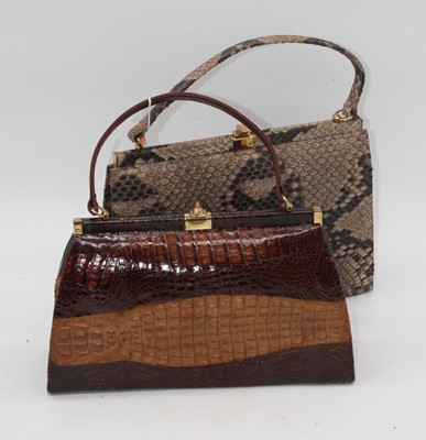 Lot 40 - A ladies faux snakeskin handbag, together with...
