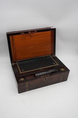 Lot 53 - A Victorian rosewood and brass mounted writing...