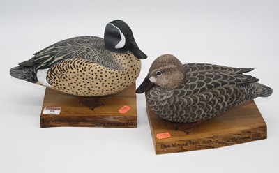Lot 58 - Two carved and painted wood models of ducks,...