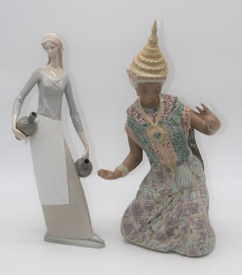 Lot 63 - A Nao porcelain figure of a woman, height...