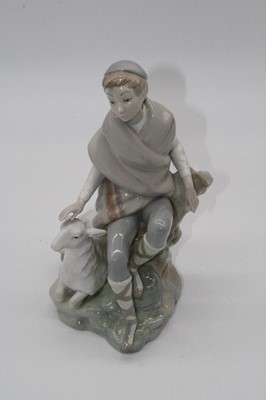 Lot 67 - A Lladro porcelain figure of a young girl...