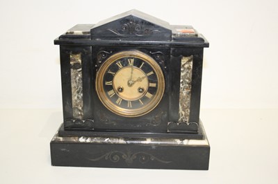 Lot 70 - A Victorian black slate 8-day mantel clock, of...