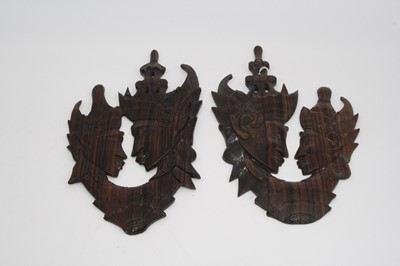 Lot 73 - An eastern carved hardwood figure group of a...