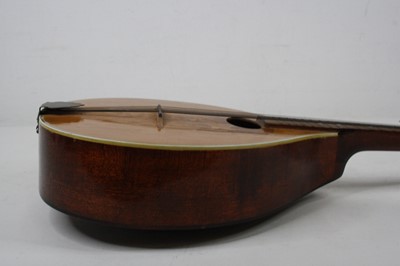 Lot 130 - An Italian marquetry inlaid eight string...