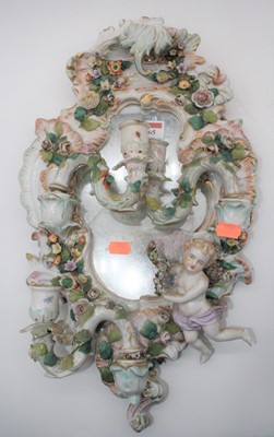 Lot 165 - A Dresden porcelain wall mirror, in the Rococo...