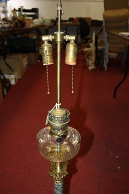 Lot 179 - A converted oil lamp, in the form of a...