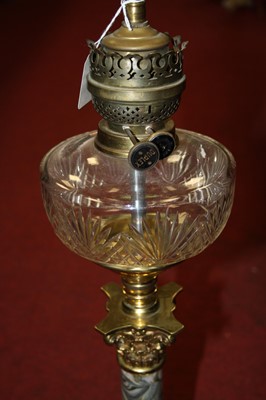 Lot 179 - A converted oil lamp, in the form of a...