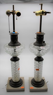Lot 181 - A pair of converted pressed glass oil lamps,...